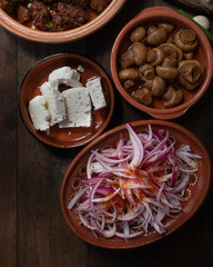 Picked onions and mushrooms with sheep cheese as traditional Eastern European side dishes