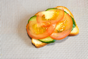 Fresh cucumber vegetable sandwich and tomato on soft bread