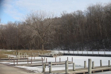 winter landscape with snow, SEVERAL PIERS ON A ICE LAKE