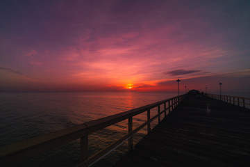 Fototapeta na wymiar Sunset at the beach. Sunrise over the sea.