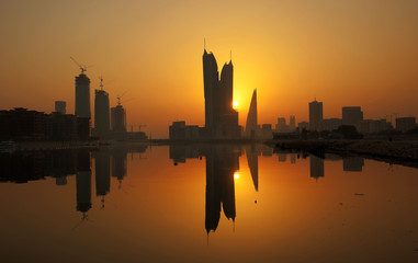 Fototapeta na wymiar Bahrain skyline with iconic buildings during sunrise