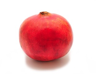 Fototapeta na wymiar Whole pomegranate on white background