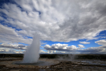 Geysir / Iceland - August 25, 2017: Strokkur geysir eruption near Golden Circle, Iceland