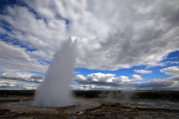 Geysir / Iceland - August 25, 2017: Strokkur geysir eruption near Golden Circle, Iceland