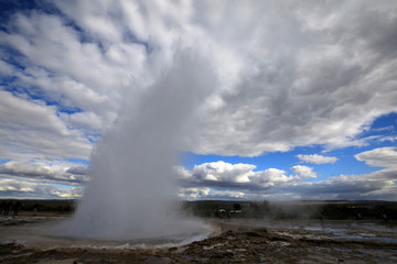 Geysir / Iceland - August 25, 2017: Strokkur geysir eruption near Golden Circle, Iceland
