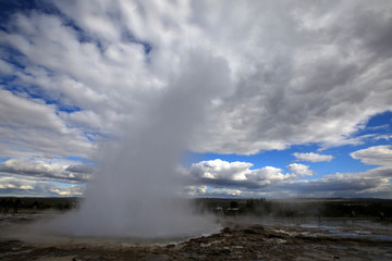 Geysir / Iceland - August 25, 2017: Strokkur geysir eruption near Golden Circle, Iceland