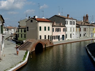 Comacchio, Italy, Townscape with Canal & Bridge