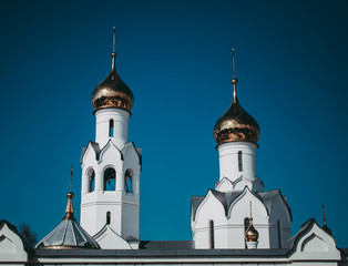 Orthodox Russian church on the streets of a modern city.