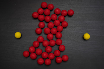 yellow ball repelling red balls