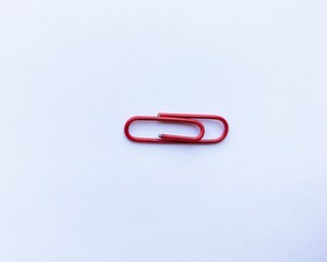paper clips on a red background