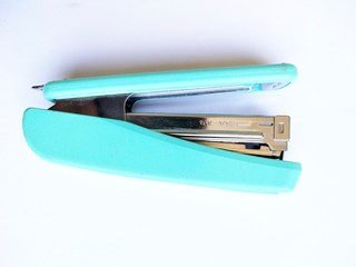 blue stapler and staples