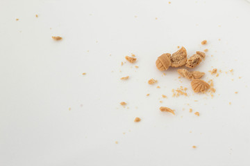 Broken candies on a white background