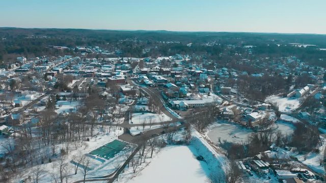 Downtown Derry New Hampshire Drone Shot Over Winter Lake