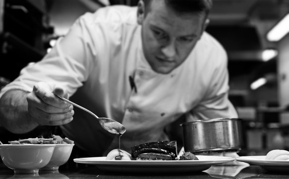 Close-up Of Chef Working