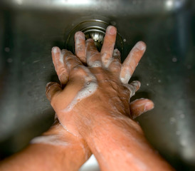 Fototapeta premium Thorough hand washing to prevent the spread of the virus. Cleaning and protection concept against Covid-19