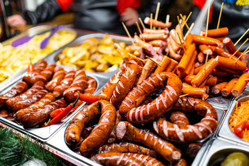Lviv, Ukraine Christmas winter market food buffet fast restaurant table display with traditional...