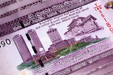 Macro photography of 500 Sri Lanka Rupee or Rupie. Paper currency of the republic Sri Lanka. Money of the island country. World Trade Centre of Ceylon Headquarter and Buddhist temple on front of note