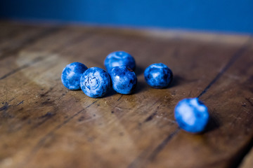 Blueberries on vintage wooden table