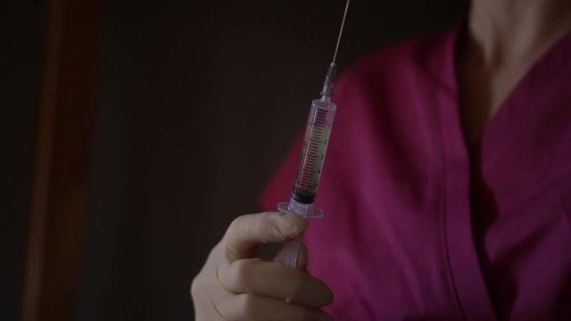 Injection preparation. Antibiotic buttocks injection. Self-injection at home.