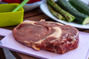 piece of meat and vegetables preparing  barbecue