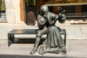 Cremona, Italy. Beautiful statue of Antonio Stradivari on the streets of Cremona. - obrazy, fototapety, plakaty