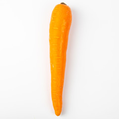 Fresh raw carrot isolated on white background.