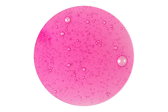 Top view of perfectly circle of pink bubbly gel on white background