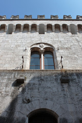 Medieval towering wall of a drawbridge in a castle, italy