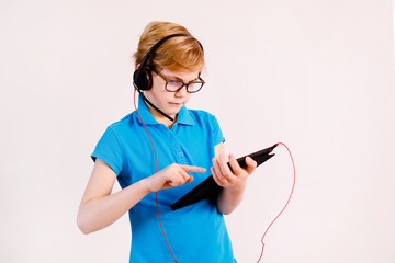 Boy studying homework during his online lesson at home, social distance during quarantine....