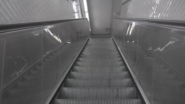 Escalator going up in Parisian subway