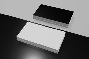 Two business cards on a black white background without text