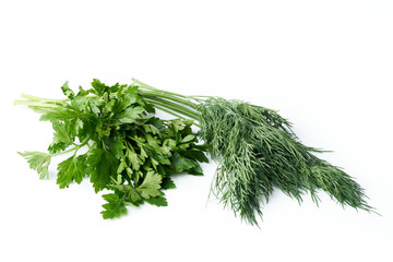 Bunch of fresh parsley and dill with small drops of water Isolated on a white background