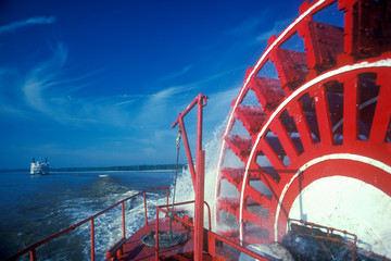 A steamboat paddle wheel on the Delta Queen Steamboat, Mississippi River - obrazy, fototapety, plakaty