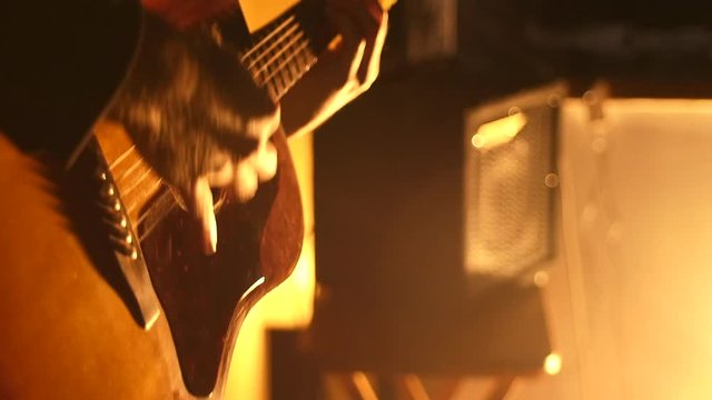 Guitarist playing on a rooftop