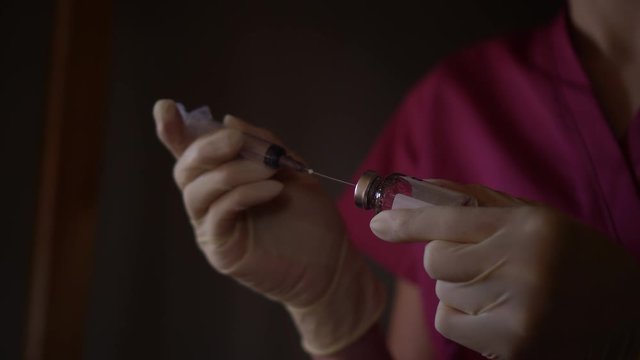 Injection preparation. Antibiotic buttocks injection. Self-injection at home.