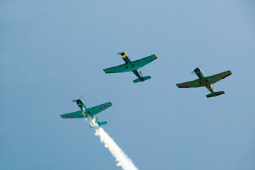 Chinese training plane releasing smoke over Ojai, California during Veteran's Day event