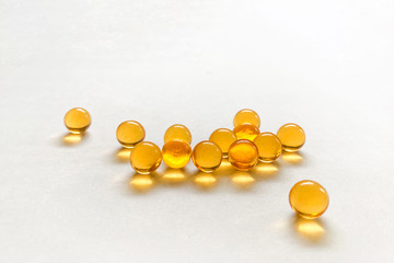 Fish oil capsules isolated on white background.

