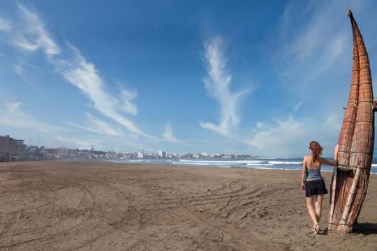 On Huanchaco Beach with Totora reed boat 