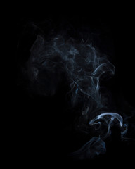 Obraz premium movement of smoke on black background, smoke background, abstract smoke on black background