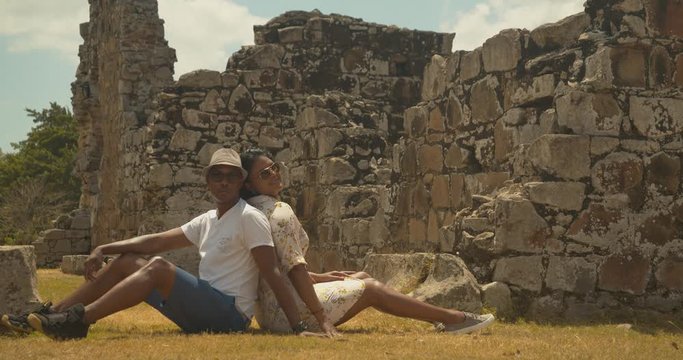 Husband and wife travel couple enjoying a video shoot in the walled anceint city of old Panama, Panama