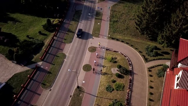 Aerial shot of a group of tourists exploring Goldap town by bike in Poland