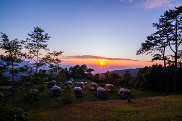 landscape of mountains , sunset ,pine tree ,Camping tent ,Thailand .