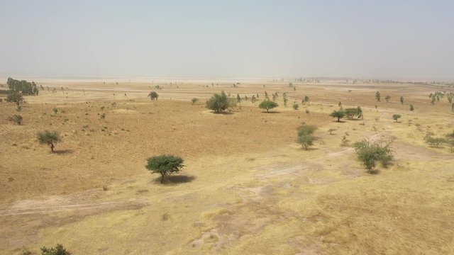 2020 - aerial over the dry savannah landscapes of Senegal, Mali or Gambia in West Africa.