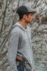 Closeup of Young man By the Northfork of the Flathead River