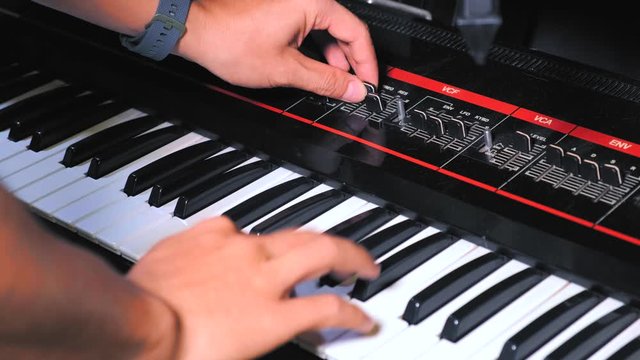 Music Producer Composes Song By Playing Vintage Roland Juno Synthesizer