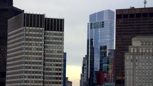 Millenium tower and One Beacon Street towers in Downtown Boston Massachusets with lights off during the COVID-19 Pandemic