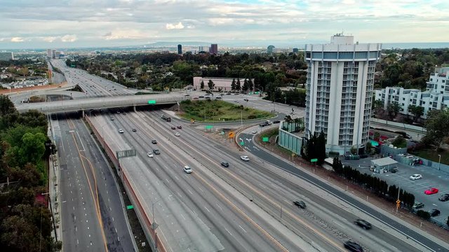 Aerial of American Freeway-405 Highway empty with no cars during Coronavirus Covid-19. Drone view in Los Angeles, California at Sunset Boulevard