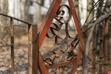 Fence of kindergarten in abandoned ghost town Pripyat in Chernobyl zone