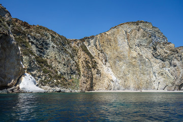Fototapeta na wymiar View of the rocky coast in Ponza island (Latina, Italy).