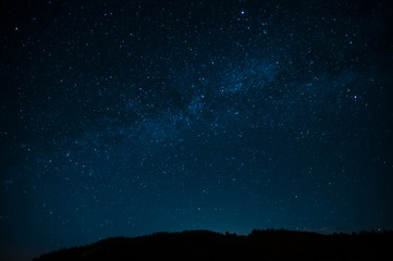 Fototapeta na wymiar Night photograph depicting stars. Night cosmic sky. Astrophotography.